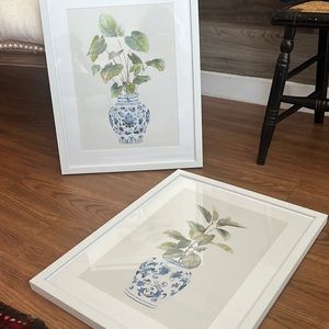 White, blue and green prints. Framed.